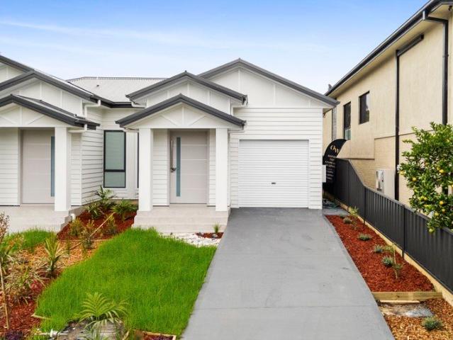 Brand New Coastal Duplex in Convenient Location