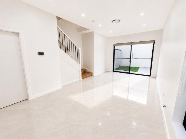 Brand New Contemporary Duplex in an Ultra Convenient Location