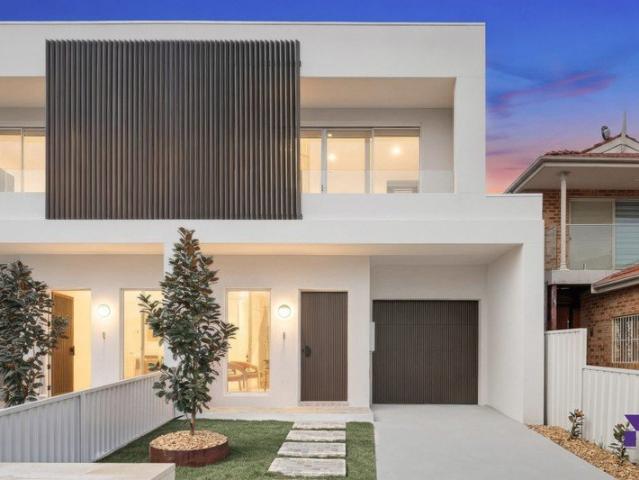 Brand new contemporary family duplex in a sought after street