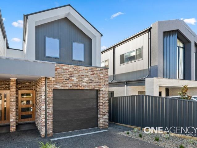 BRAND NEW CONTEMPORARY LIVING IN THE HEART OF TULLIMBAR