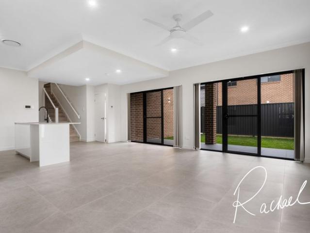 Brand New Corner Townhouse with Oversized Living & Private Courtyard