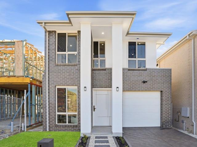 BRAND NEW, Custom Built Masterpiece with Premium Finishes Throughout!