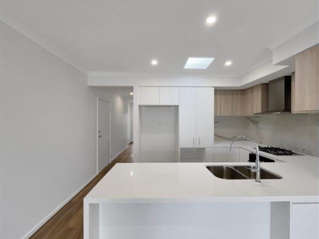 Brand New and Low Maintenance Living!