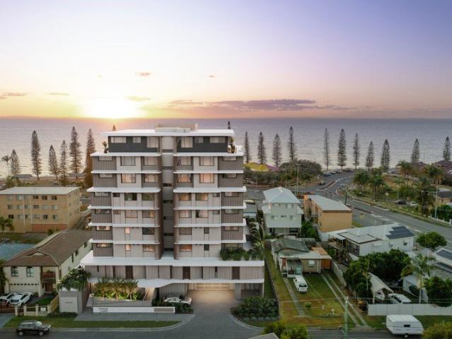 Brand New Apartment in highly desirable boutique complex. Moreton Bay water views, spacious open plan living, and high end finishes
