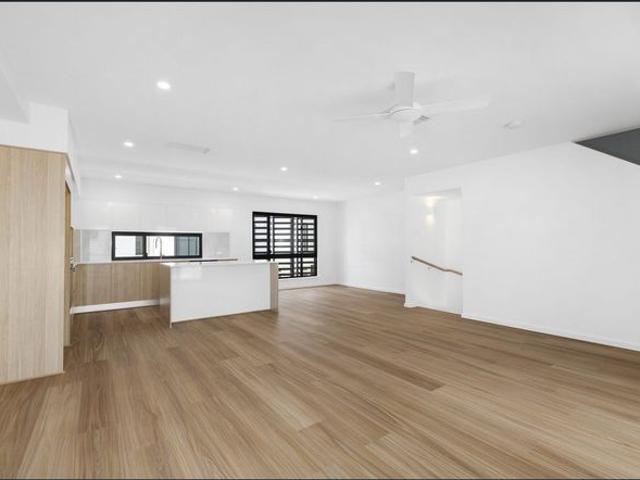 Brand New Architectural Townhouse with Solar Power, Exceptional Space & Premium Multi Level Living