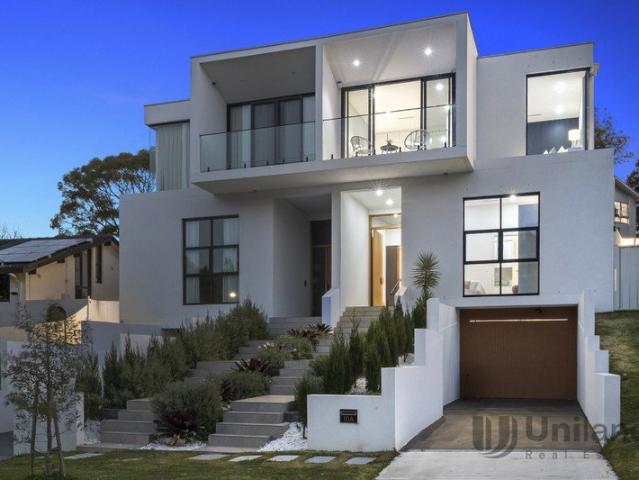 Brand New Architectural Duplex with Panoramic District View