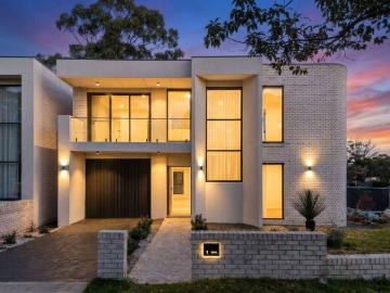 Brand New Architectural Luxury in a Premier Riverwood Setting
