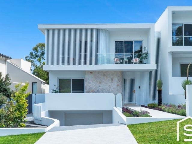 Brand New Architectural Masterpiece | Three Levels of Exceptional Space & Quality | Rare Five Car Basement Garage