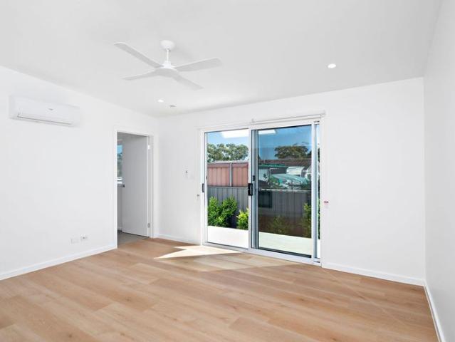 BRAND NEW ARCHITECTURALLY DESIGNED HOME WITH OFF STREET PARKING