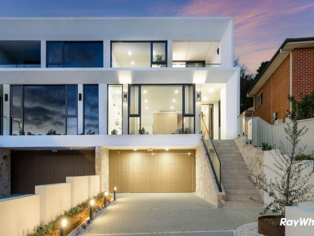 Brand new double brick home with multiple living spaces and a stunning outlook!