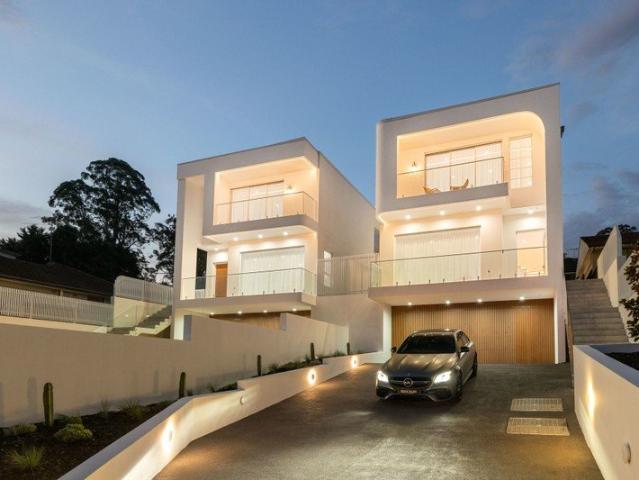 BRAND NEW DESIGNER HOME WITH LUXURY OVER THREE BREATHTAKING LEVELS IN A BLUE RIBBON LOCATION