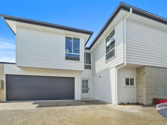 Brand New Designer Home Modern Sophistication in Blue Chip Clayfield