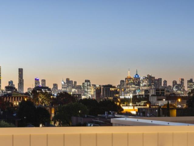 Brand new designer living with a private rooftop terrace and panoramic views of the CBD!