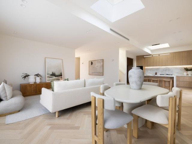 Brand new duplex in convenient location with three living areas & district outlook