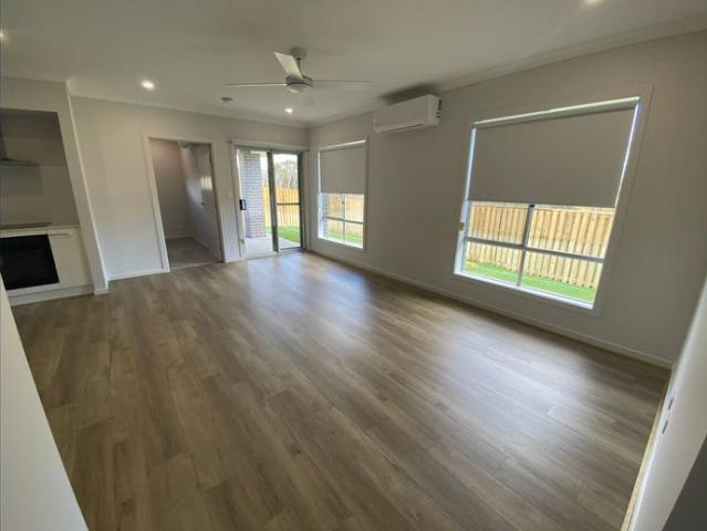 BRAND NEW DUPLEX WITH MODERN COMFORTS WITHIN WALKING DISTANCE TO LOCAL SCHOOLS