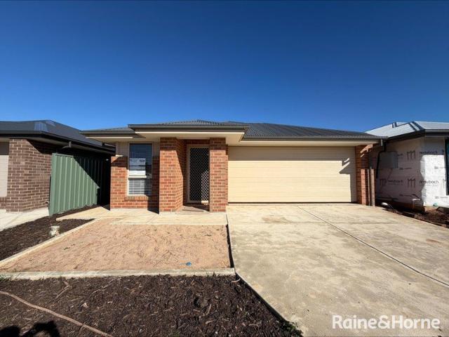 Brand New Easy Living in Evanston Garde[ns