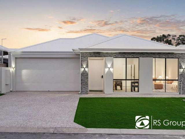 Brand New Exceptional Family Living in the Heart of Wildflower!