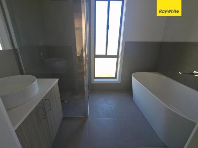 Brand New Four Bedroom Home Modern, Low Maintenance Living