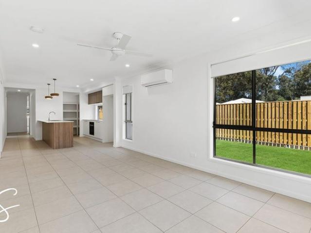 Brand New Four Bedroom Home with two living areas!
