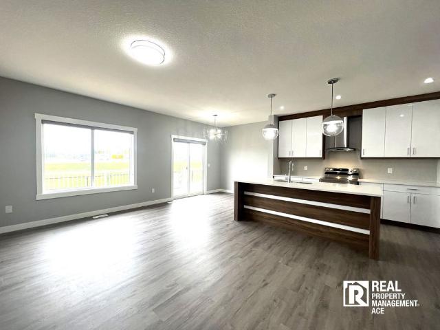 BRAND NEW Family Home in Strathmore / Duplex / Double Garage/Unfinished Basement