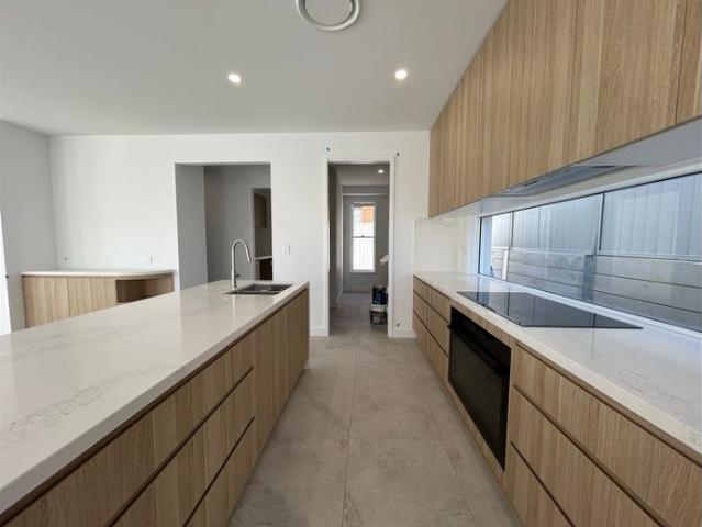 BRAND NEW FAMILY HOME IN PRIME BENOWA LOCATION