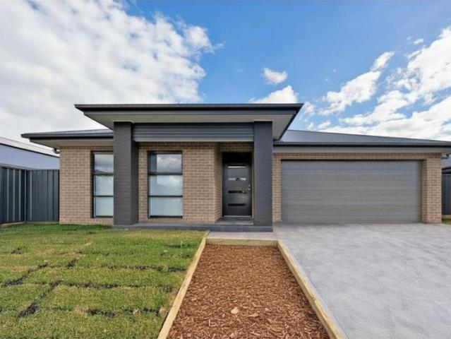 BRAND NEW FAMILY HOME PACKED WITH FEATURES INCLUDING SOLAR, DUCTED AIR CONDITIONING & DOUBLE GARAGE