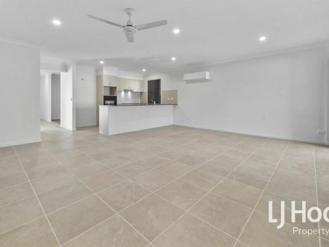 Brand New Family Home with Two Living Areas in a Thriving Location