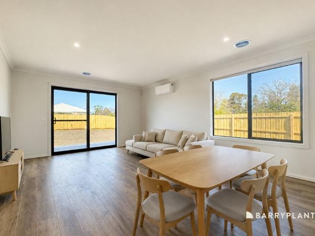 Brand New Family Living with Room to Move