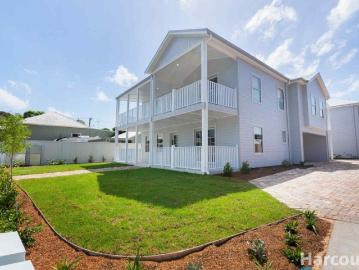 Brand new freestanding 4 bedroom home in pretty, riverside setting