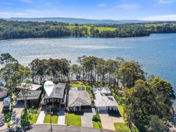 Brand New Front Row Luxury Architectural Designer Living with Uninterrupted Lake Views at Kings Point
