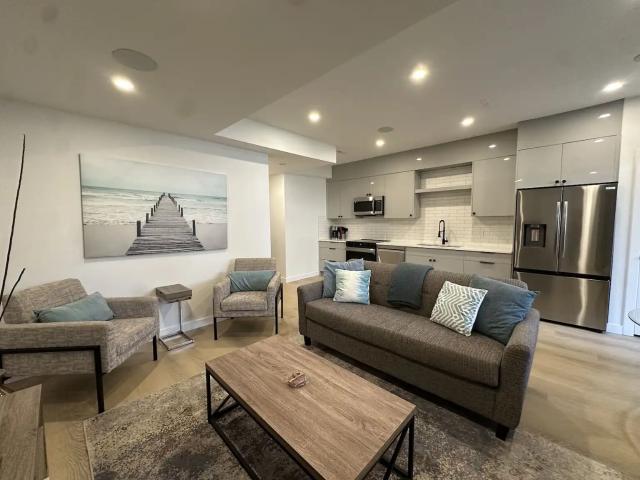 NEW Fully Furnished Walk Out Basement Suite in Trendy SW Neighbourhood