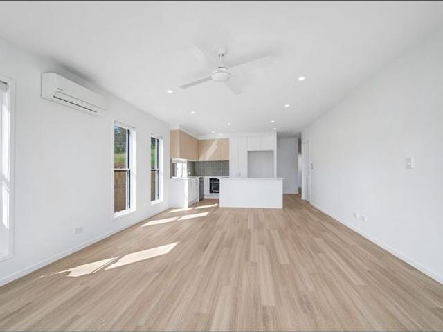 Brand new home, very low maintenance with an elevated outlook