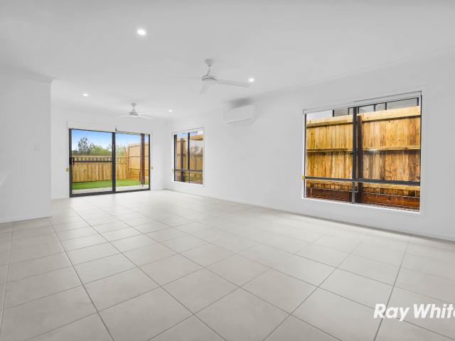 BRAND NEW HOME WITH TWO LIVING AREAS!