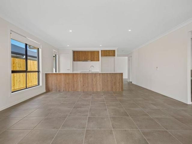 BRAND NEW HOME WITH 2 LIVING SPACES & LARGE YARD!