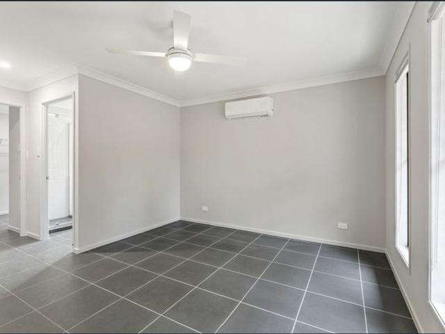 Brand New Home in the Heart of Springbrook with Solar and Large Yard