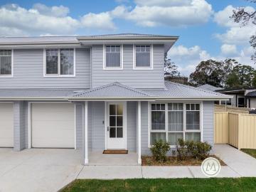 BRAND NEW HAMPTONS INSPIRED DUPLEX WITH STUNNING MOUNTAIN VIEWS!