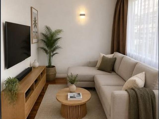 Brand new internally renovated large single level flat just 400m from Town Beach