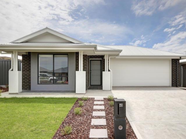 Brand New, Low Maintenance Home