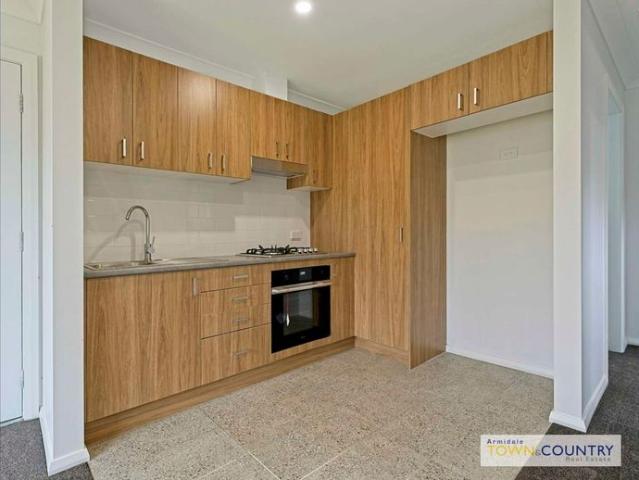 Brand New, Low Maintenance Living in a Modern Home