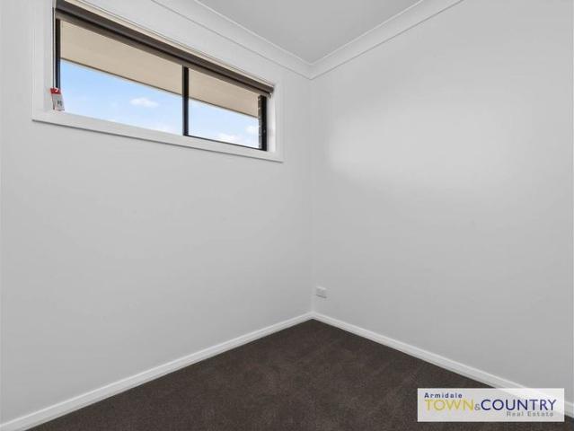 Brand New, Low Maintenance Living in a Modern Home