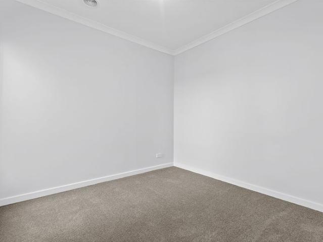 Brand New, Low Maintenance Living in a Convenient Location!