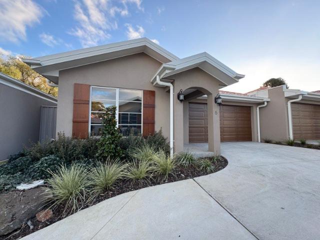 Brand New, Low Maintenance Living in a Convenient Location