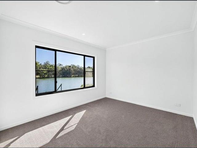 Brand New Lakefront Home Just 5 Minutes Walk To The Beach