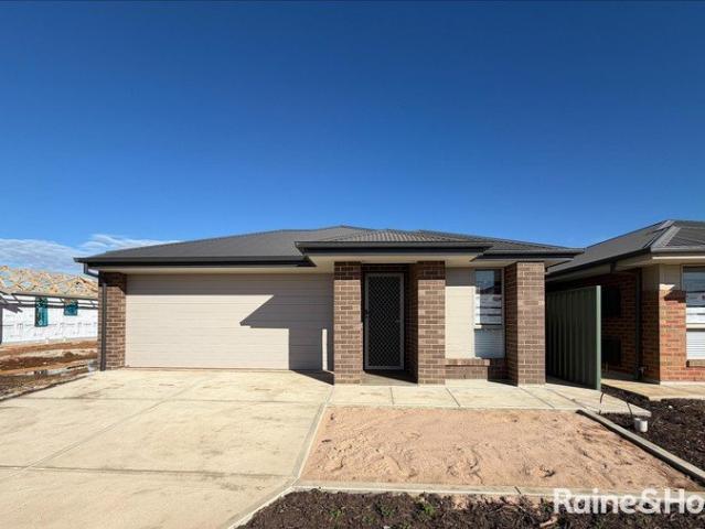 Brand New Living in a Prime Evanston Gardens Location!