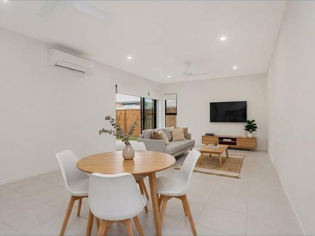 BRAND NEW LIVING IN THE HEART OF AURA