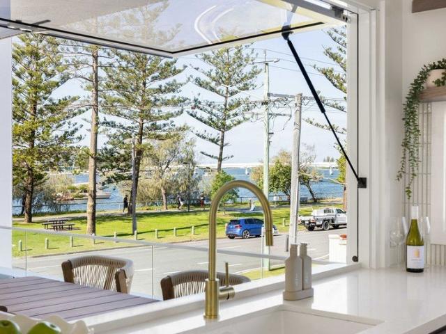 Turnkey Waterfront Luxury. Absolute Broadwater Frontage. Forever Views!