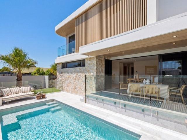 BRAND NEW NEVER LIVED IN Luxury Coastal Living with Solar + Battery Power