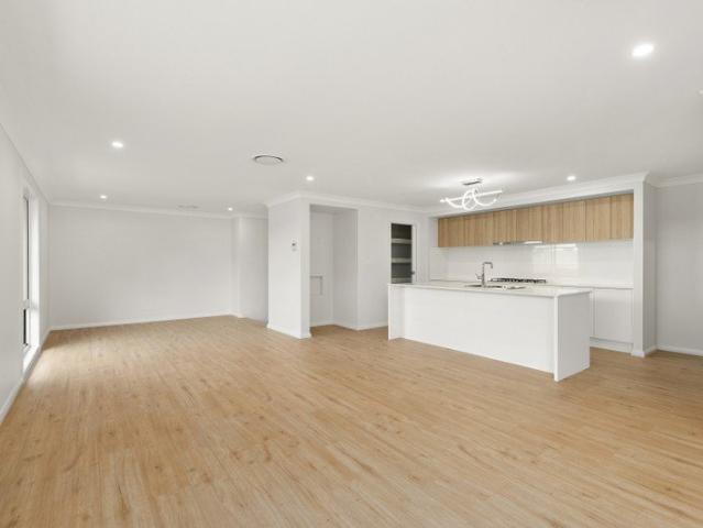 Brand New Luxury Living in Prestigious Brush Creek Estate