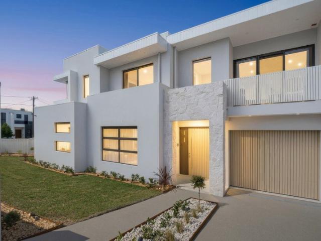 Brand New Luxurious Duplex Offering Contemporary Family Living
