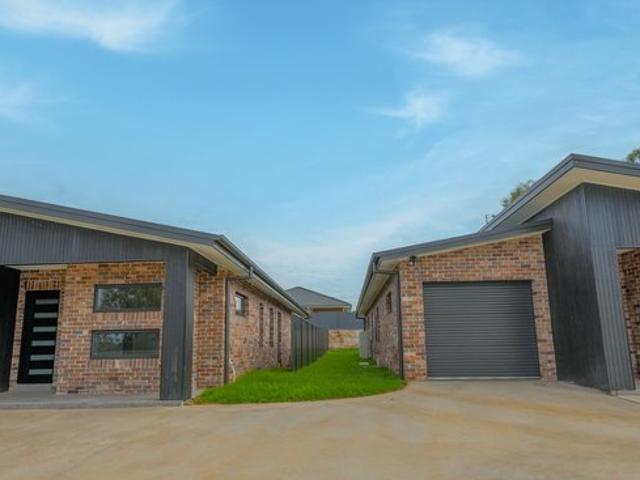 Brand New Modern Duplexes Buy One or Both! The Ultimate Home or Investment Opportunity